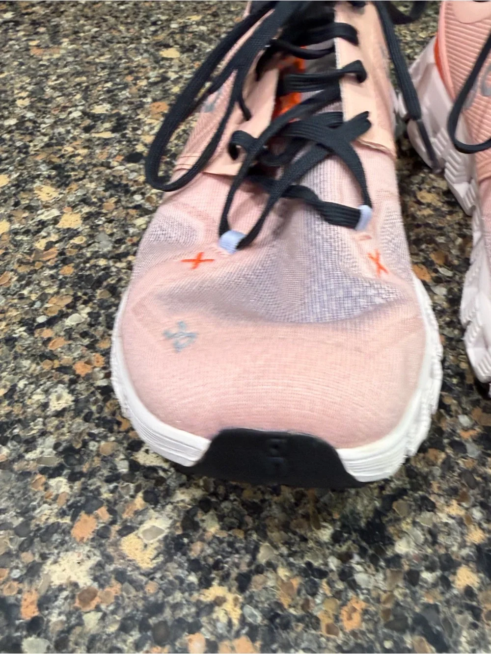 On Cloud Running Shoes in white with Orange Accent ladies 9
